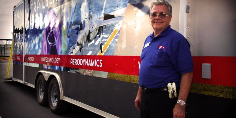 V. J. Willis, Trailblazer Facilitator in front of the Trailblazer II Mobile Science Museum