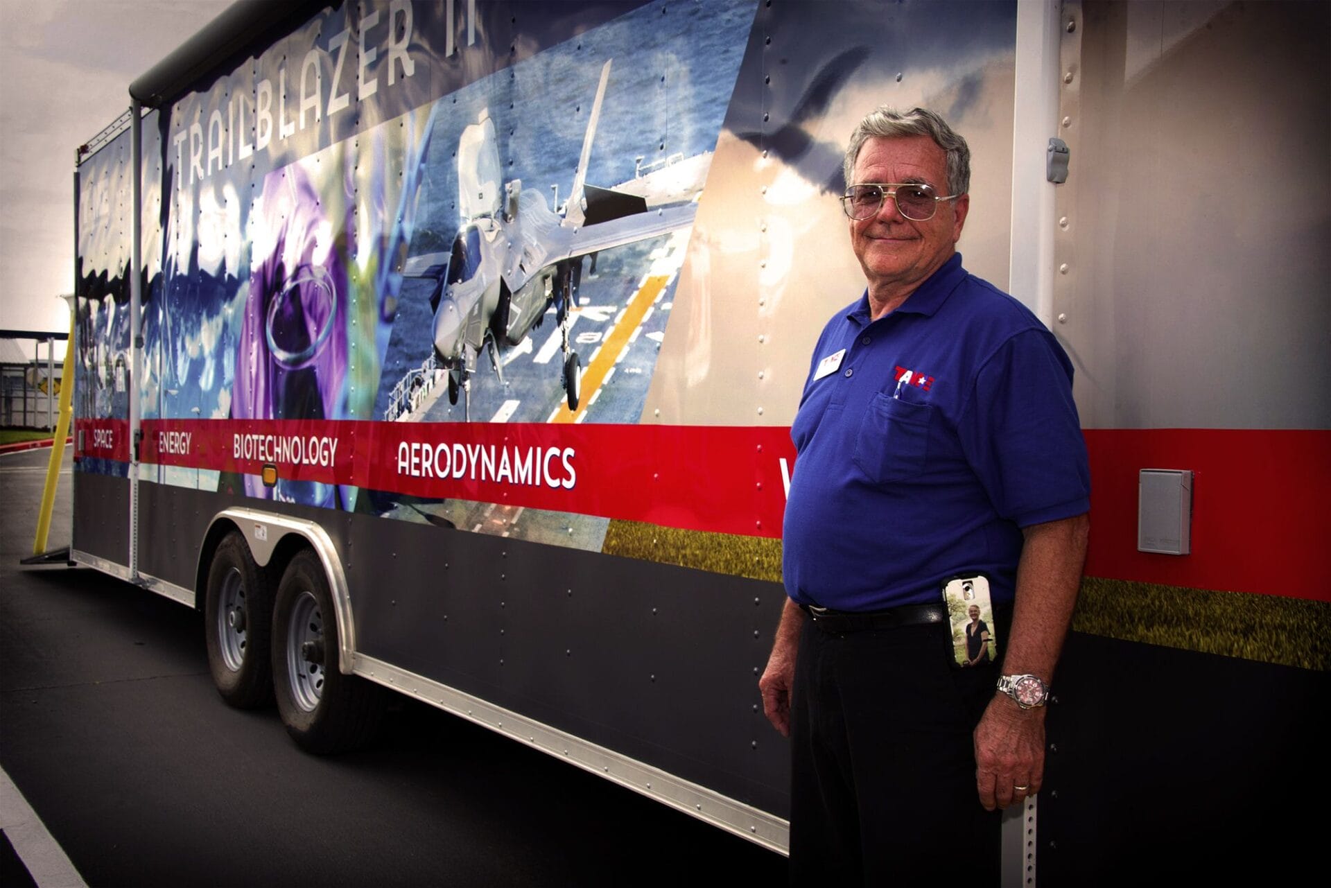 V. J. Willis, Trailblazer Facilitator in front of the Trailblazer II Mobile Science Museum