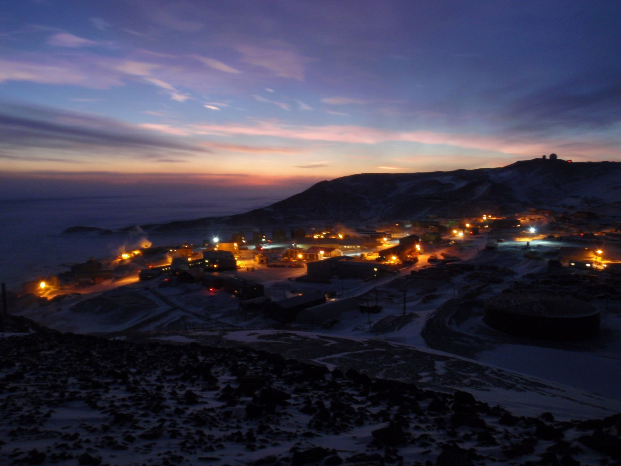 Sunset over Antarctic - Nacreous Clouds Over McMurdo 5, by Alan Light, Shared under a Creative Commons Attribution License