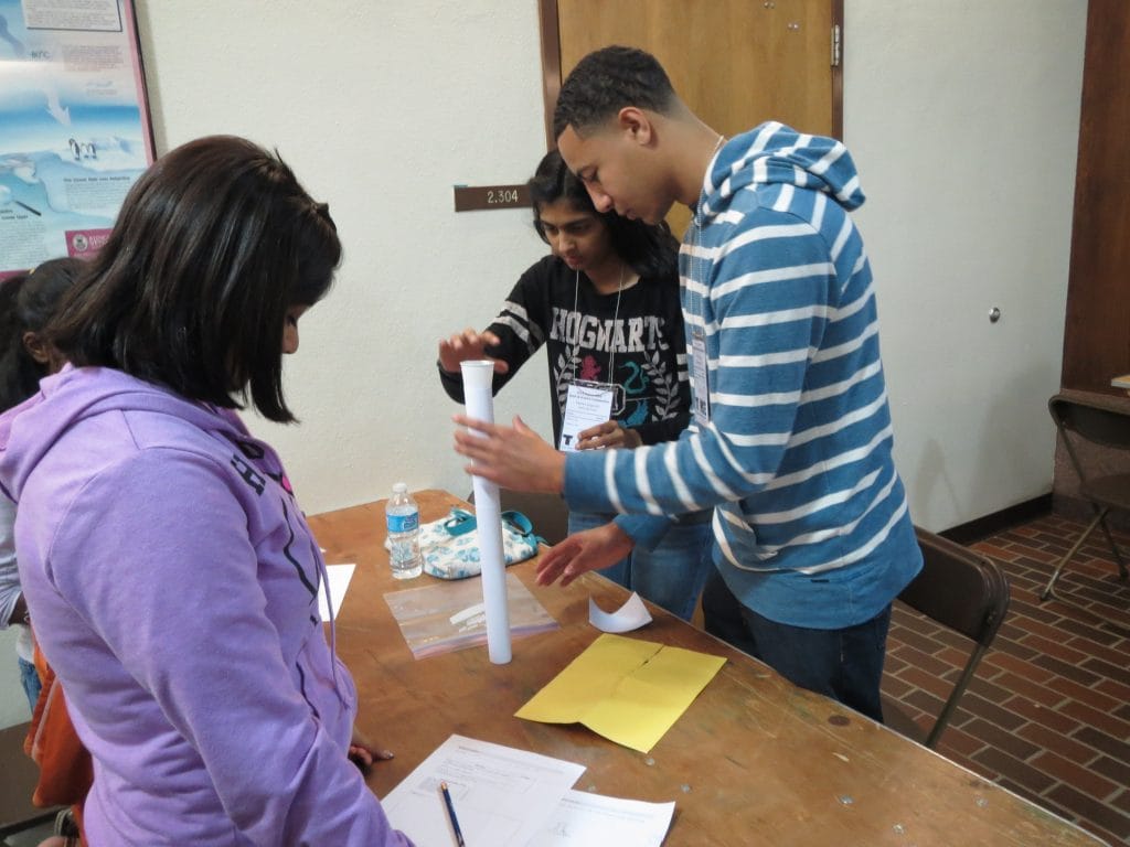 Students work on a prototype of an Olympic Tower, from the 2014 Capital Area Divisional Math & Science Competition, hosted at The University of Texas at Austin.